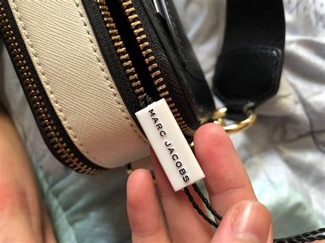 how to spot fake marc jacobs bag|marc jacobs tote bag copy.